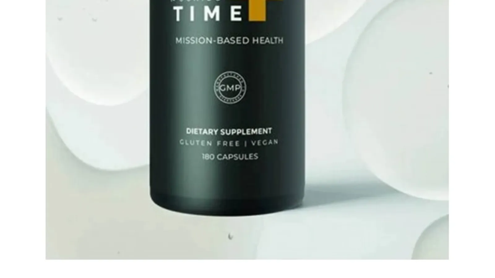 A bottle of Nuchido TIME+ NAD+ supplement on a pale grey surface
